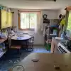 CASA DE 3 DORMITORIOS, CON GRAN PATIO Y ARBOLES NATIVOS